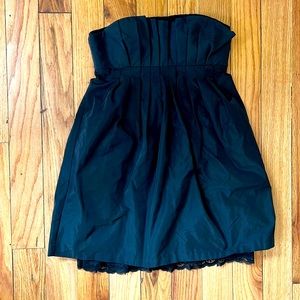 Sold BCBG cocktail dress with pockets and zip back.